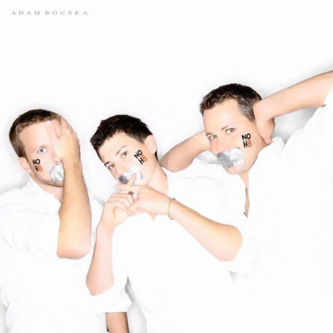 Thomas Staed, Levi Renegar and Cody Renegar take a family portrait for the NoH8 campaign. The campaign is a silent protest against discrimination in conjunction to Proposition 8, which was passed in California in 2008. Prop 8 amended the state Constitution to ban same-sex marriage.Photo credit: Adam Bouska